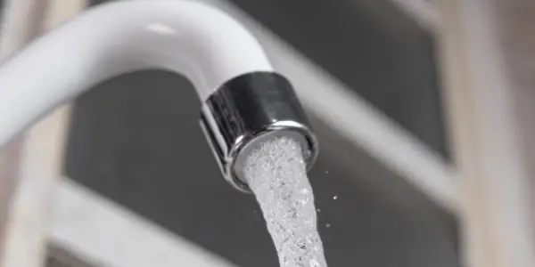 White kitchen sink faucet - Close up